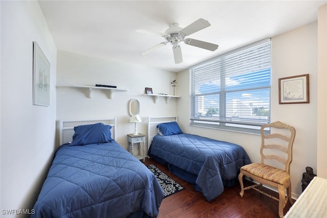 bedroom with ceiling fan and hardwood / wood-style floors