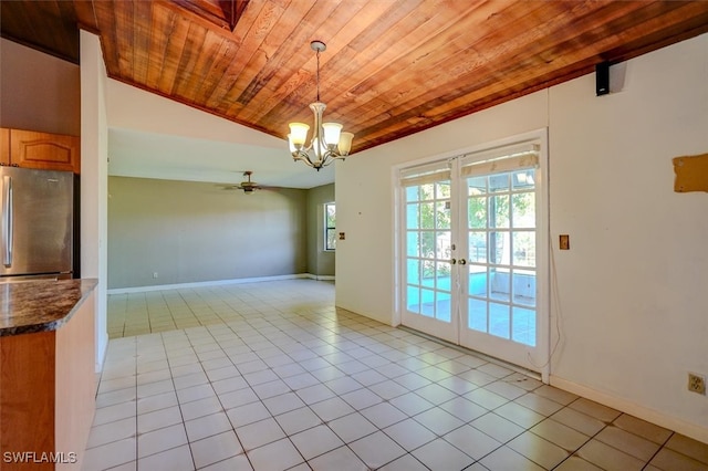 interior space featuring french doors, wood ceiling, light tile patterned flooring, and lofted ceiling