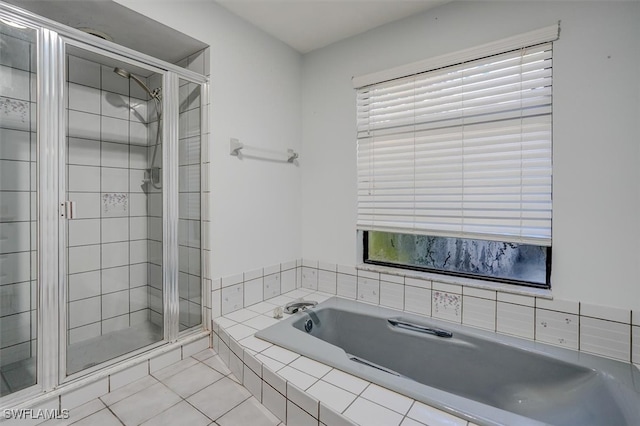 bathroom with tile patterned floors and plus walk in shower