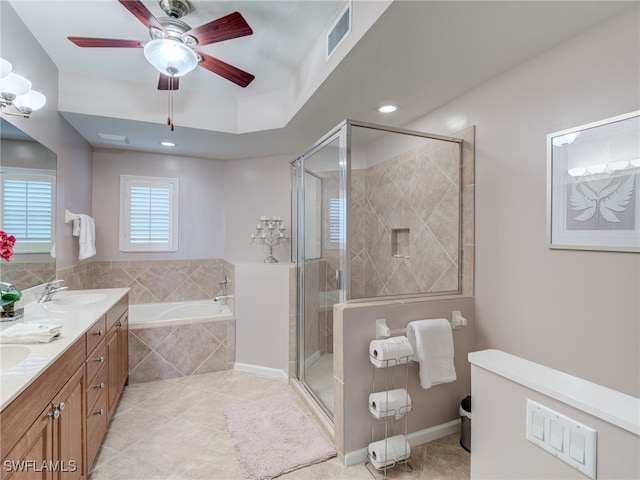 bathroom featuring vanity, plus walk in shower, tile patterned floors, and ceiling fan