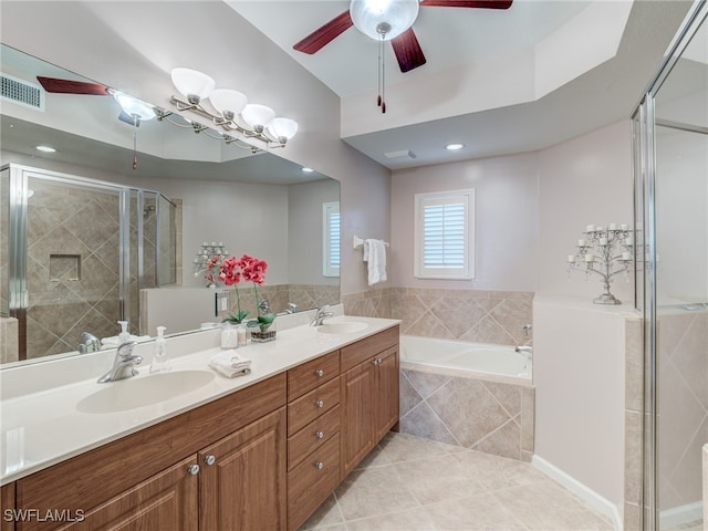 bathroom featuring vanity, shower with separate bathtub, ceiling fan, and tile patterned flooring