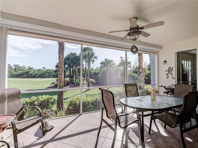 sunroom / solarium with plenty of natural light and ceiling fan