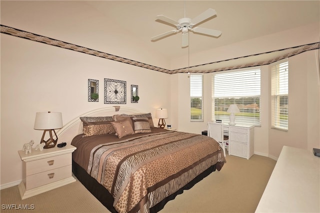 bedroom featuring ceiling fan and light colored carpet