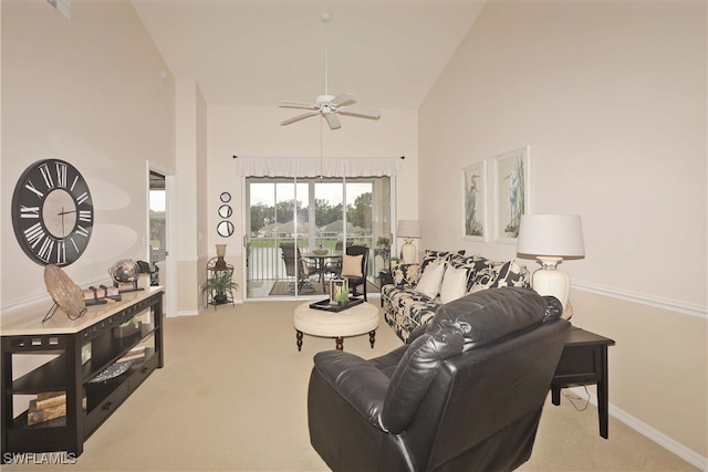 living room with carpet, ceiling fan, and high vaulted ceiling