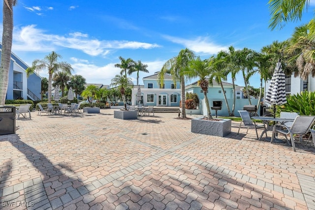 view of patio with an outdoor fire pit