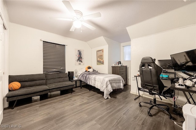 bedroom featuring hardwood / wood-style floors and ceiling fan