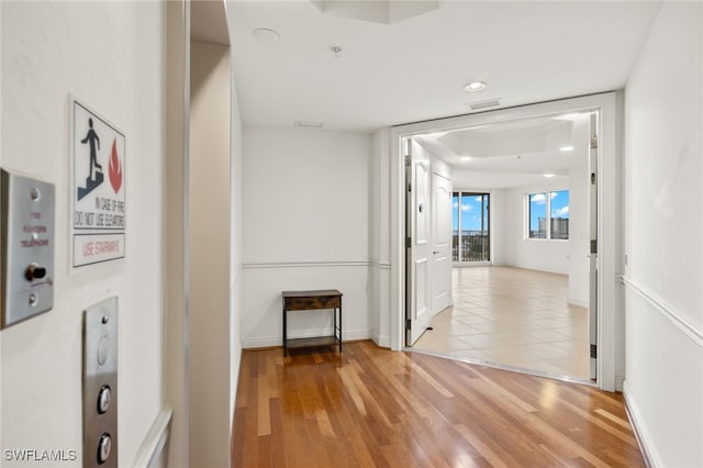 hallway featuring light wood-type flooring