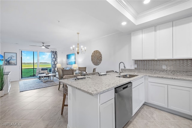 kitchen featuring sink, crown molding, dishwasher, and white cabinets