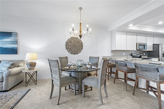 dining space featuring a notable chandelier, light tile patterned floors, and crown molding