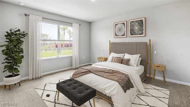 bedroom featuring light carpet