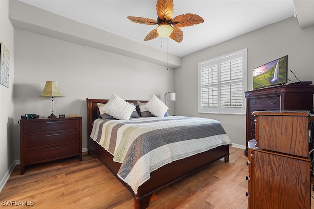 bedroom featuring ceiling fan and hardwood / wood-style floors