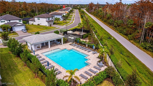 view of swimming pool featuring a patio area