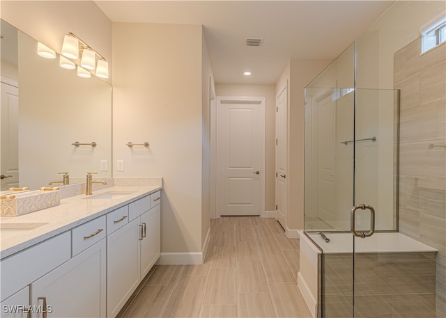 bathroom featuring vanity and walk in shower