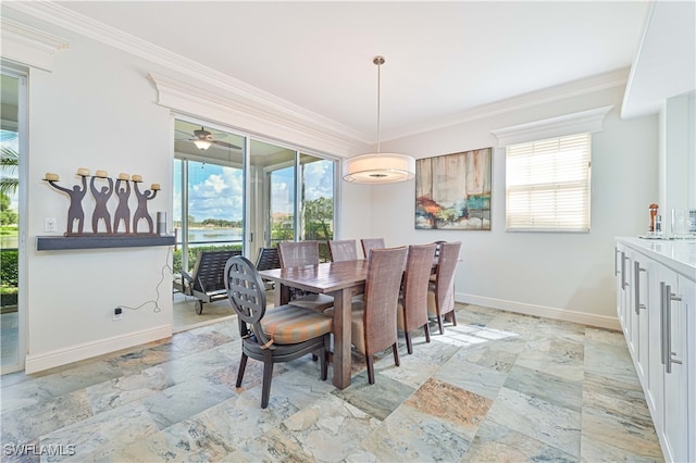 dining area featuring a wealth of natural light, crown molding, and ceiling fan