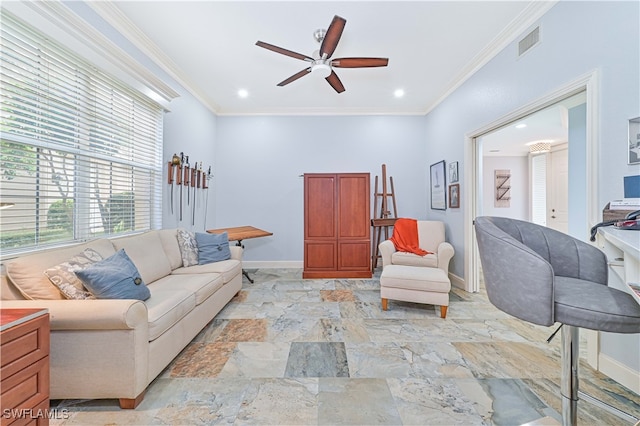 living room with ornamental molding and ceiling fan