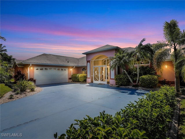 view of front of property featuring a garage