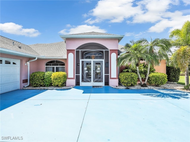 property entrance featuring a garage