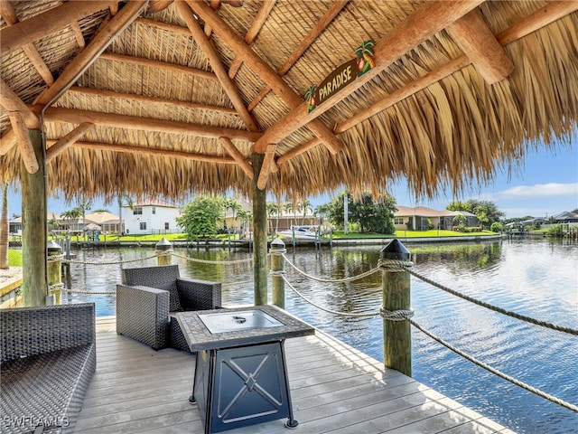 dock area with a water view