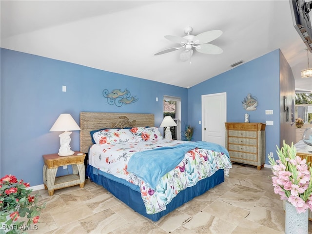 bedroom with ceiling fan and lofted ceiling