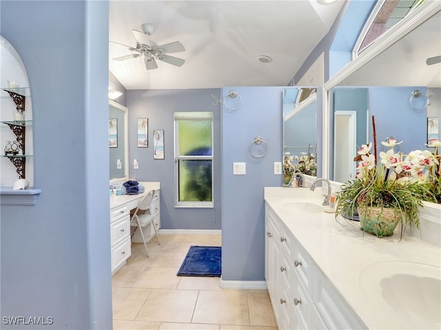 bathroom with ceiling fan, tile patterned flooring, vanity, and a wealth of natural light