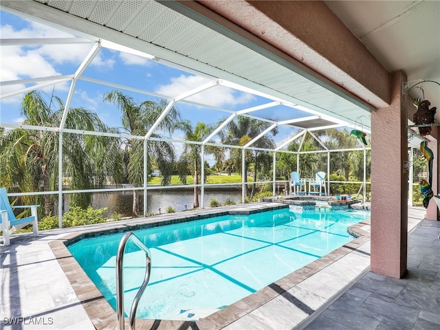 view of swimming pool with an in ground hot tub, a patio, glass enclosure, and a water view