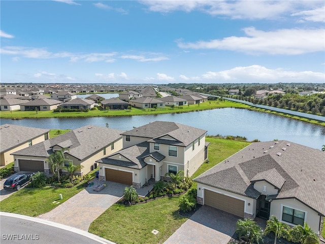 drone / aerial view with a water view