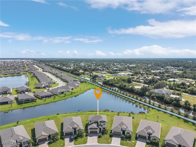 drone / aerial view with a water view