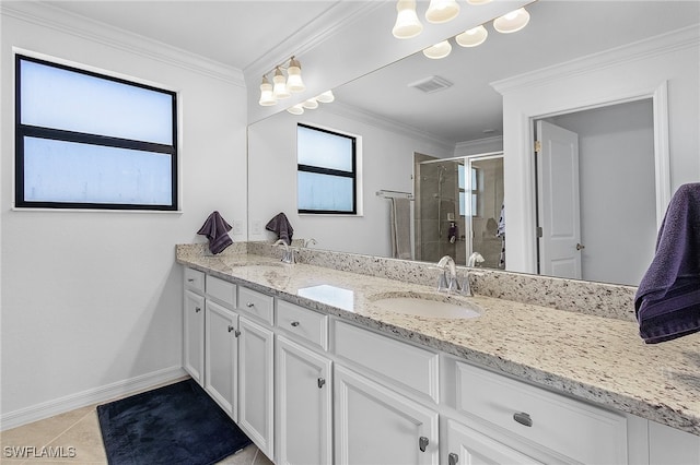 bathroom with vanity, tile patterned floors, ornamental molding, and an enclosed shower