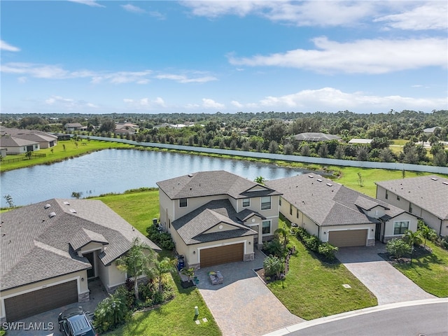 drone / aerial view with a water view