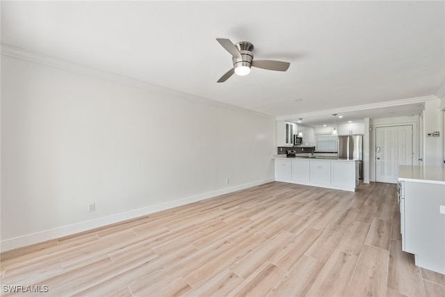 unfurnished living room with light hardwood / wood-style floors, ornamental molding, and ceiling fan