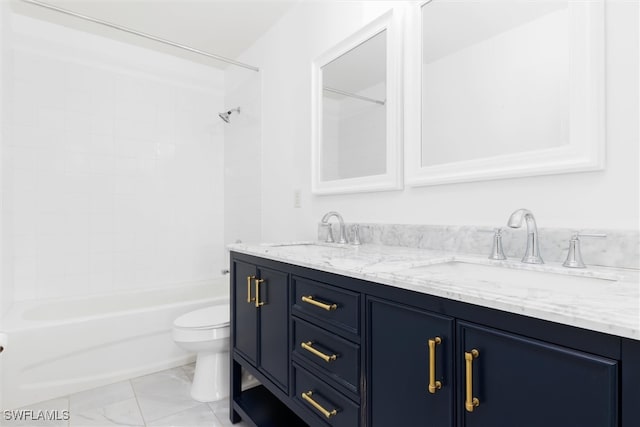 full bathroom with vanity, tiled shower / bath combo, and toilet