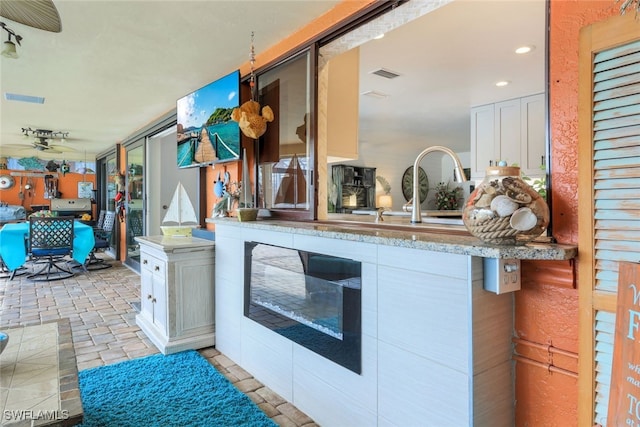 view of patio / terrace with ceiling fan