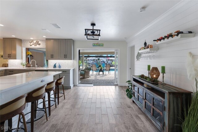 kitchen with sink and tasteful backsplash