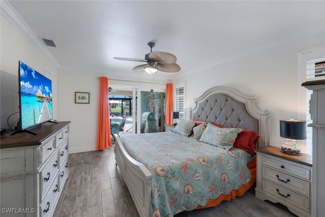 bedroom with access to exterior, light hardwood / wood-style flooring, ceiling fan, and crown molding