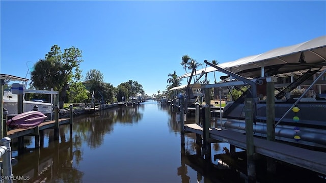 dock area featuring a water view