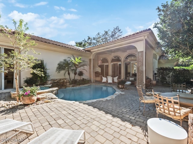 view of pool with a patio