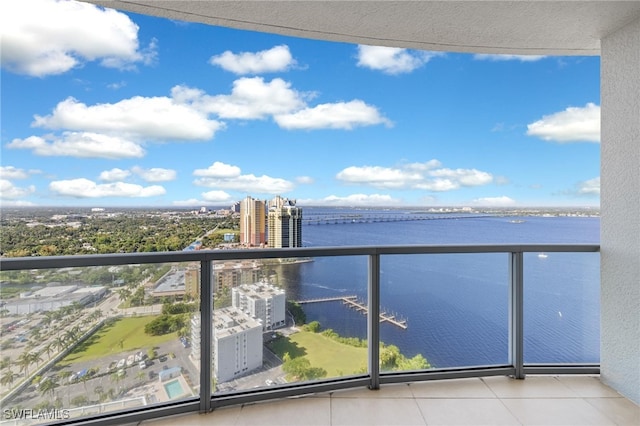 balcony featuring a water view