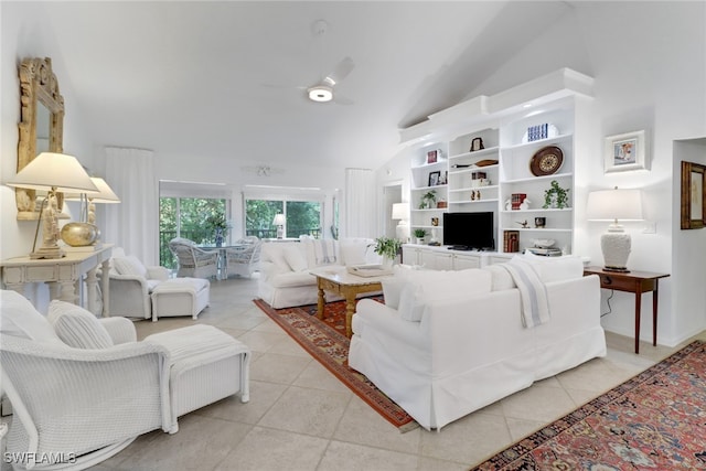 living area featuring high vaulted ceiling, a ceiling fan, and light tile patterned floors