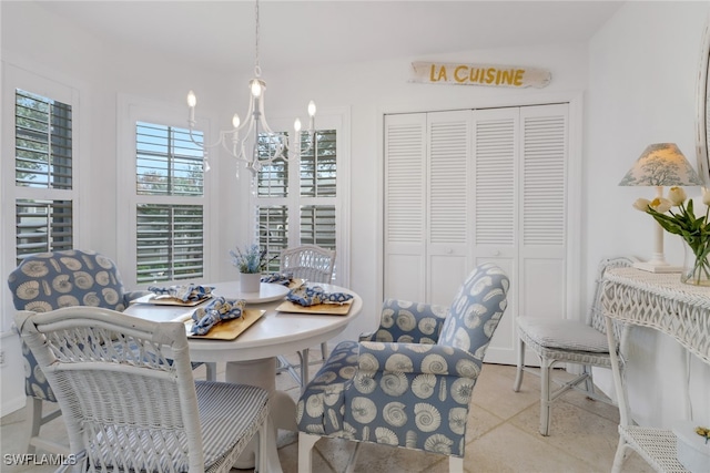 dining room with a notable chandelier