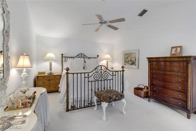 bedroom featuring ceiling fan, carpet floors, lofted ceiling, and visible vents