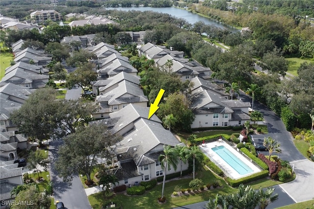 aerial view featuring a residential view and a water view
