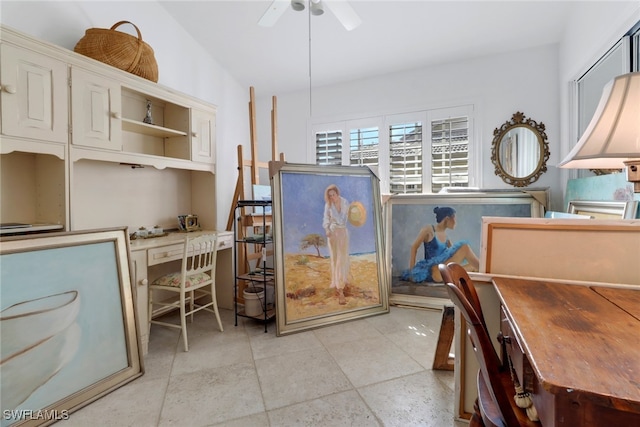 interior space with ceiling fan and lofted ceiling