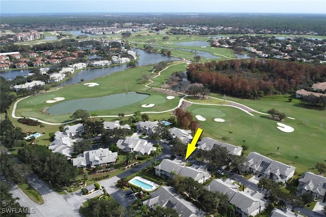 birds eye view of property featuring a residential view, golf course view, and a water view
