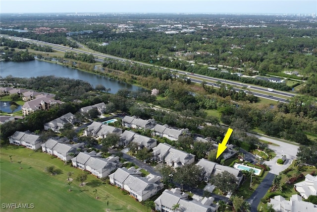 aerial view featuring a residential view and a water view
