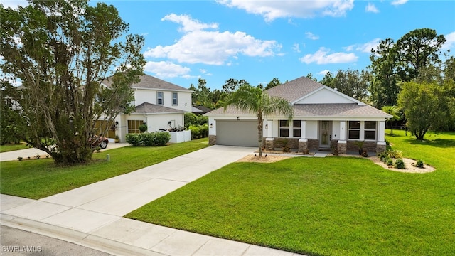 view of front of property featuring a front lawn and a garage