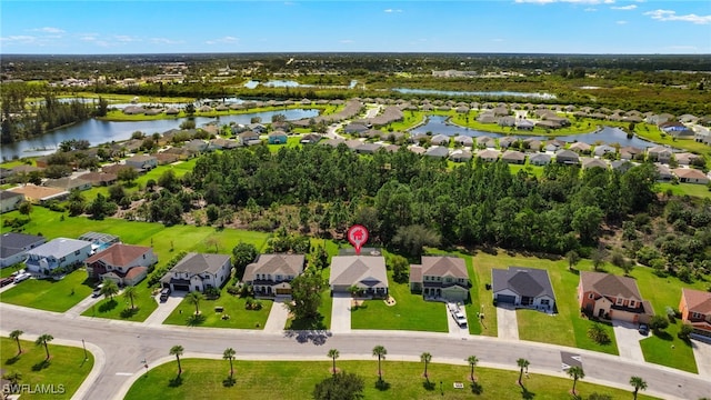 bird's eye view with a water view