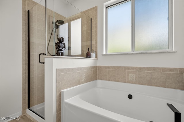 bathroom with plus walk in shower