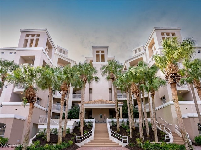 view of building exterior featuring stairway