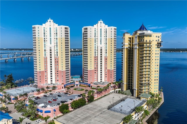 birds eye view of property with a water view