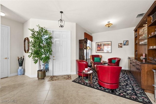 11309 Pond Cypress St, Fort Myers, FL 33913 - foyer entrance with baseboards and tile patterned flooring